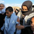Un chico vuelve con su familia, tras estar secuestrado en Baghouz por las milicias del ISIS.&nbsp;