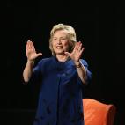 MIAMI, FL - FEBRUARY 26: Hillary Rodham Clinton, Former Secretary of State flashes a U symbol before speaking speaking during an event at the University of Miamis BankUnited Center on February 26, 2014 in Coral Gables, Florida. Clinton is repor...