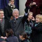 Former US President Bill Clinton (C), his wife Hillary Rodham Clinton (R) and New York Governor Andrew Cupomo (L) arrive for the inauguration of New York City Mayor Bill de Blasio on the steps of City Hall in Lower Manhattan on January 1, 2014 ...