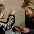 WASHINGTON, DC - DECEMBER 06: Former U.S. Secretary of State Hillary Clinton (R) is presented the 2013 Tom Lantos Human Rights Prize by Annette Lantos (L) December 6, 2013 in Washington, DC. Clinton received the award for her work in the areas ...