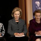 WASHINGTON, DC - DECEMBER 06: Former U.S. Secretary of State Hillary Clinton (C), former U.S. Secretary of State Madeleine Albright (R), and Annette Lantos bow their heads during a moment of silence for former South African President Nelson Man...