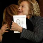 WASHINGTON, DC - DECEMBER 06: Former U.S. Secretary of State Hillary Clinton (R) embraces Katrina Lantos Swett (L), President of the Lantos Foundation, before Clinton was presented the 2013 Tom Lantos Human Rights Prize December 6, 2013 in Wash...
