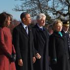 U.S. President Barack Obama(2nd-L), First Lady Michelle Obama(L) along with former president Bill Clinton(3rd-L) and former secretary of state Hillary Clinton(4th-L) take part in a wreath-laying ceremony in honour of the late 35th president of t...