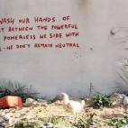 Junto con el corto, Banksy ha dejado varias obras por toda la zona, una de ellas en tinta roja con la frase: "Si nos lavamos las manos respecto al conflicto entre los poderosos y los impotentes nos ponemos del lado del poderoso, no permanecemos ...