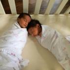 "We always put our twin girls down to sleep in the same bed, but about a foot apart. Every time, they would manage to wind to touching one another. It was like magic because they were able to do this just days after coming home from the hospital...