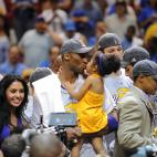 Kobe Bryant of the Los Angeles Lakers celebrates victory with his family following Game 5 of the NBA Finals against the Orlando Magic at Amway Arena on June 14, 2009 in Orlando, Florida. The Lakers won the National Basketball Association champio...