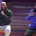 PARIS, FRANCE - OCTOBER 21: Kobe Bryant and Ronny Turiaf, his French team-mate for three seasons (2005-2008) in Los Angeles gives a "Mamba talk" as they reflect on their NBA memories at "Le Quartier" renovated gymnasium dedicated to basketball g...