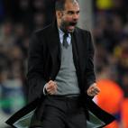 Barcelona's coach Pep Guardiola celebrates after his team scores a goal during their Champions League round of 16, 2nd leg football match FC Barcelona vs Arsenal on March 8, 2011 at Camp Nou stadium in Barcelona. AFP PHOTO / LLUIS GENE (Photo cr...