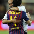 Barcelona's coach Josep Guardiola (L) celebrates with Barcelona's midfielder Cesc Fabregas after their victory on Real Madrid at the end of the second leg of the Spanish Supercup football match FC Barcelona vs Real Madrid CF on August 17, 2011 a...