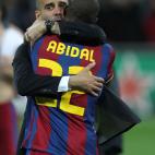 Barcelona manager Josep Guardiola celebrates with Eric Abidal after the final whistle
