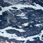 "Tonight's Finale: Asteroid impact - the Manicouagan Crater in Quebec. On old scar, but a big one at 100 km across."