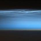 In this photo posted on Twitter by Canadian astronaut Chris Hadfield on Jan. 6, 2013, a Noctilucent Cloud, a rare super high altitude cloud barely visible from Earth, is seen at dawn in the mesosphere from International Space Station. Hadfield i...