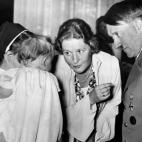 A picture dated 1939 shows German nazi Chancellor and dictator Adolf Hitler (R) with Emmy Goering (C) talking to a baby hold by a nun. AFP PHOTO / FRANCE PRESSE VOIR (Photo credit should read -/AFP/Getty Images)
