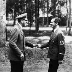 Austrian-born German Fuhrer and Reichskanzler (essentially Chancellor) Adolf Hitler (1889 - 1945) (left) greets his Propaganda Minister Joseph Goebbels (1987 - 1945) a few hours after Hitler survived an assassination attempt by members of the Ge...
