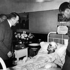 Austrian-born German Fuhrer and Reichskanzler (essentially Chancellor) Adolf Hitler (1889 - 1945) (foreground, left) visits with officers wounded in the July 20 attempt to assassinate Hitler by members of the German military, Germany, late July,...