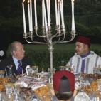 Don Juan Carlos y Mohamed VI durante una de las cenas oficiales.