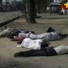In this frame grab from TV footage shot by the Nigeria television authority on Monday, Oct. 8, 2012 but aired Tuesday, Oct. 9, 2012, shows people lying down (condition of people unknown) on a street in Maiduguri, Nigeria. (AP Photo / Nigeria Tel...