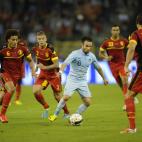 France's midfielder Mathieu Valbuena (C) vies with Belgium's defense during a friendly football match between Belgium and France at King Baudouin stadium in Brussels on August 14, 2013. AFP PHOTO / JOHN THYS (Photo credit should read JOHN...