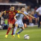 Belgium's midfielder Eden Hazard (L) and France's forward Mathieu Valbuena vie for the ball during the 2014 World Cup friendly football match between Belgium and France at the King Baudouin stadium in Brussels on August 14, 2013. AFP PHOTO / JOH...
