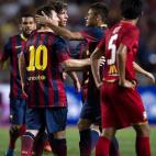 FC Barcelona's Lionel Messi (2nd L) and Neymar (2nd R) celebrate after scoring against Thailand during their exhibition match with Thailand's national football team at the Rajamangala football stadium in Bangkok on August 7, 2013. AFP PHOTO/ Nic...