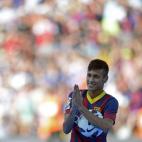 FC Barcelona's new signing Neymar gestures during his official presentation at the Camp Nou stadium in Barcelona, Spain, Monday, June 3, 2013. Neymar arrived in Barcelona on Monday to complete his deal with the Catalan club, which will see the B...