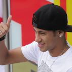 Barcelona's new player Brazilian Neymar da Silva Santos Junior poses for photographers outside Camp Nou's stadium in Barcelona, on June 3, 2013. Santos and Brazil star Neymar signed a five-year contract with Spanish giants Barcelona. AFP PHOTO /...
