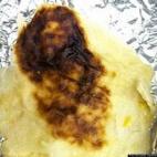 Edward Garza, an 80-year-old from Texas, found that his usual breakfast taco had a divine garnish: a burn pattern that he thinks looks a lot like Jesus Christ. What do you think? Vote here.
