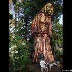 Michael Meredith swears the nearly 30-foot tall statue he built in his Springfield backyard isn't intended to be a representation of the Virgin Mary. But the pilgrims have come to his doorstep anyway.