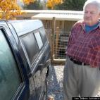 Jim Stevens stands next to his truck that has an image on the window resembling Jesus Christ. Stevens, of Jonesborough, Tenn., said Nov. 2 that the image keeps reappearing, but he doesn't know how or why.