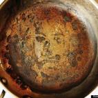 In April 2005, an Australian man said he saw the image of Jesus Christ in this frying pan after he burned lemon mustard cream sauce in it.