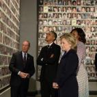 President Barack Obama, former New York Mayor Michael Bloomberg, first lady Michelle Obama, former Secretary of State Hillary Clinton and former President Bill Clinton tour the National September 11 Memorial & Museum on May 15, 2014 in New York....