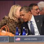 President Barack Obama listens to then-Secretary of State Hillary Clinton during the NATO summit at McCormick Place on May 20, 2012 in Chicago, Illinois.