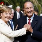 La canciller alemana, Angela Merkel, y el por entonces presidente francés, Jacques Chirac, en 2006 durante la cumbre del G8.