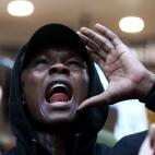 AUCKLAND, NEW ZEALAND - JUNE 01: UFC fighter Israel Adesanya joins in the protest down Queen Street on June 01, 2020 in Auckland, New Zealand. The rally was organised in solidarity with protests across the United States following the killing of ...