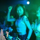 WUHAN, CHINA - SEPTEMBER 18: (CHINA OUT) People dance inside the disco bar on September 18, 2020 in Wuhan, Hubei province, China. As there have been no recorded cases of community transmission in Wuhan since May, life for residents is returning...