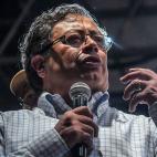Left-wing Colombian presidential candidate Gustavo Petro delivers a speech during a campaign rally in Medellin, Colombia, May 20, 2022. - Petro is leading in opinion polls for the upcoming presidential election on May 29. (Photo by JOAQUIN SARMI...