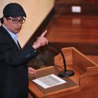 Bogota Mayor, former April 19 (M-19) guerrilla movement member Gustavo Petro, takes part in a public hearing on July 24, 2012, in the courts of the State Council, at the Palace of Justice in Bogota, Colombia. Petro faces a lawsuit loss of invest...