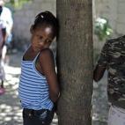 A girl stands in a orphanage being used by U.N. children's agency UNICEF for Haitian children separated from their parents after the Jan. 12 earthquake, in the outskirts of Port-au-Prince, Wednesday, Jan. 27, 2010. UNICEF has brought eight child...