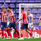 Los jugadores del Atlético de Madrid celebran el gol de Correa, el primero del duelo y que era vital