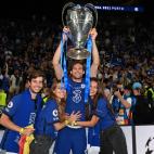 PORTO, PORTUGAL - MAY 29: Marcos Alonso of Chelsea poses with the Champions League Trophy alongside family following their team's victory during the UEFA Champions League Final between Manchester City and Chelsea FC at Estadio do Dragao on May 2...