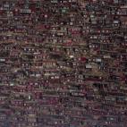 Este lugar es conocido como Larung Gar, en la Prefectura autónoma tibetana de Garzê. Las viviendas pertnecen a miles de religiosos y religiosas budistas.