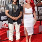 LOS ANGELES, CA - APRIL 13: TV personalitites Charlamagne Tha God (L) and Carly Aquilino attend the 2014 MTV Movie Awards at Nokia Theatre L.A. Live on April 13, 2014 in Los Angeles, California. (Photo by Michael Buckner/Getty Images)