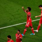 Bayern Munich's French forward Kingsley Coman (C) celebrates after opening the scoring during the UEFA Champions League final football match between Paris Saint-Germain and Bayern Munich at the Luz stadium in Lisbon on August 23, 2020. (Photo by...