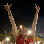 Detalle de una simpatizante del izquierdista Partido de los Trabajadores, celebrando la victoria de Lula.