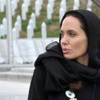 Hollywood actress Angelina Jolie pays her respects at the Srebrenica-Potocari Genocide Memorial cemetery, near Srebrenica, on March 28, 2014. Jolie and Hague are in Sarajevo for a conference on sexual violence in war organised by Bosnia's defenc...