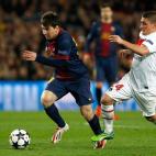 Barcelona's Lionel Messi, from Argentina, left, escapes PSG's Marco Verratti, from Italy, during the Champions League quarterfinal second leg soccer match between FC Barcelona and Paris Saint-Germain FC at the Camp Nou stadium in Barcelona, Spai...