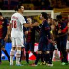 PSG's Zlatan Ibrahimovic, from Sweden, left, shakes hands with Barcelona's Lionel Messi, from Argentina, at the end of the Champions League quarterfinal second leg soccer match between FC Barcelona and Paris Saint-Germain FC at the Camp Nou stad...