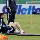 Argentina's Lionel Messi watches teammates during a training session in Buenos Aires, Argentina, Tuesday, March 19, 2013. Argentina will face Venezuela in a 2014 World Cup qualifying soccer game in Buenos Aires on March 22. (AP Photo/Eduardo Di Baia)