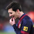 Barcelona's Lionel Messi from Argentina reacts after losing the Copa del Rey soccer match between FC Barcelona and Real Madrid at the Camp Nou stadium in Barcelona, Spain, Tuesday, Feb. 26, 2013. (AP Photo/Manu Fernandez)