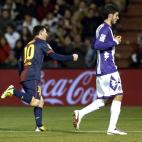 Barcelona's Argentinian forward Lionel Messi (L) celebrates after scoring during the Spanish league football match Real Valladolid vs FC Barcelona at the Jose Zorilla stadium in Valladolid on December 22, 2012. Barcelona won the match 3-1. AFP ...